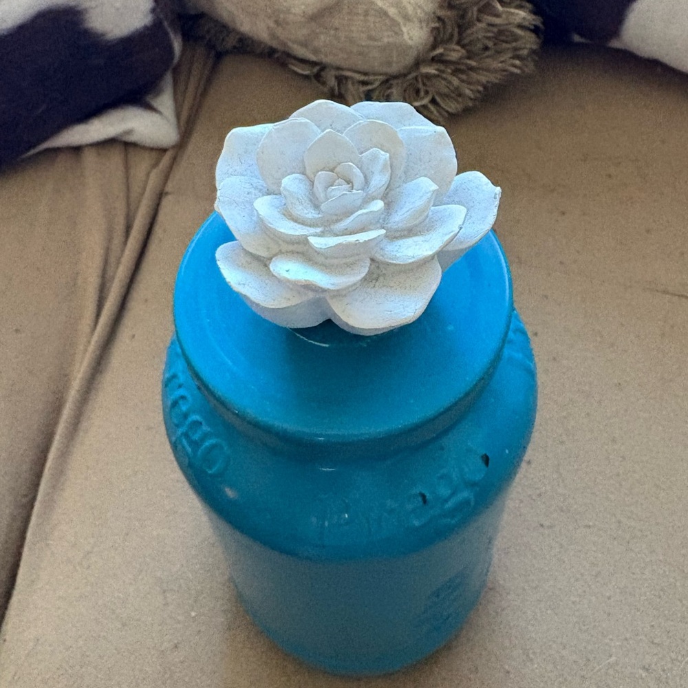Handmade storage jar with flower topper